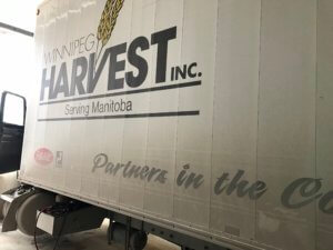 A white trailer with the words " partners in the business."