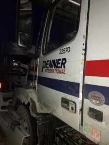 A truck with the name penner international on it.